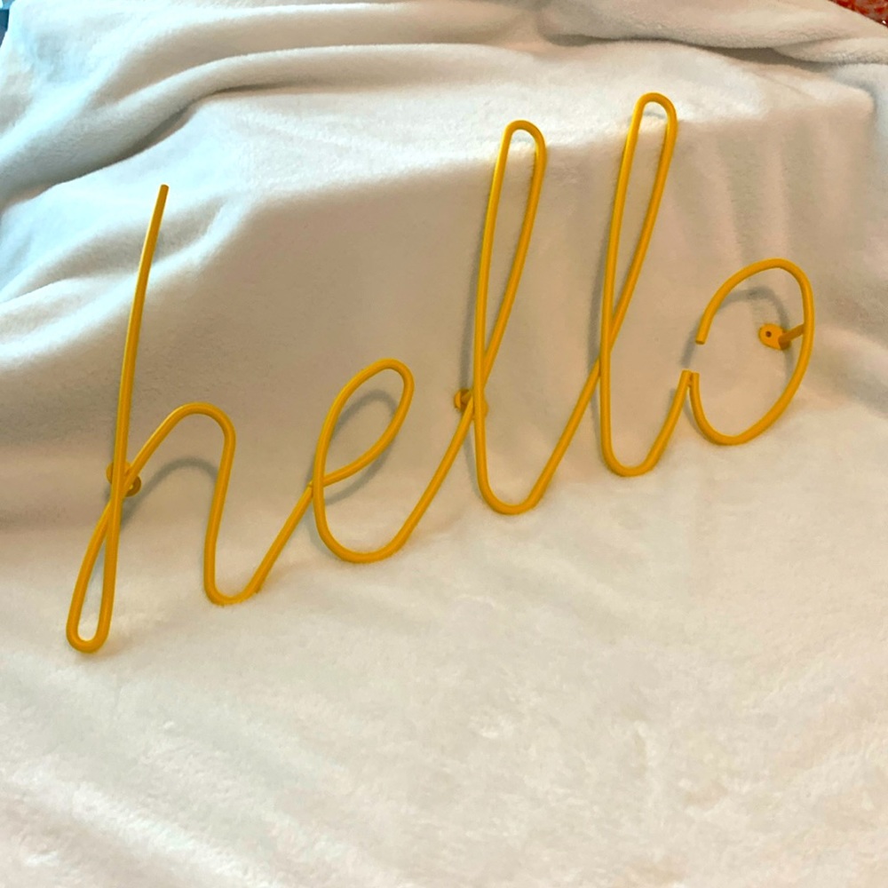 “Hello” Decorative Wall Sign in Bright Yellow Metal